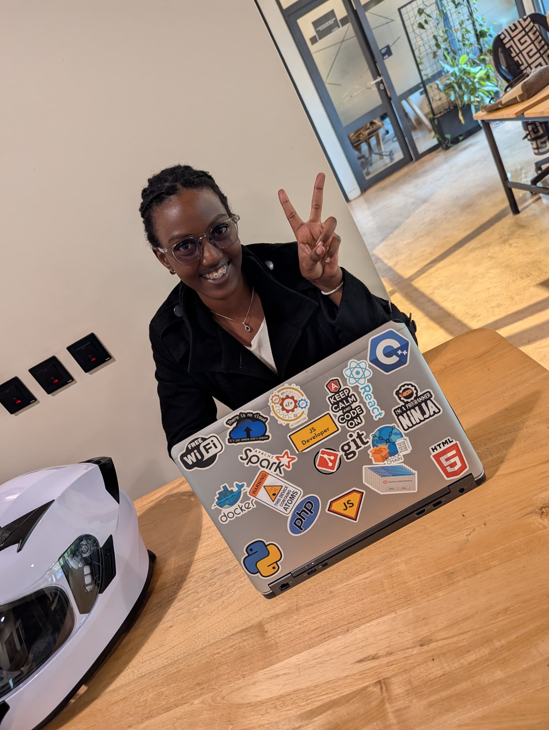 Esther, Senior Software Developer at Medisoft, at her laptop